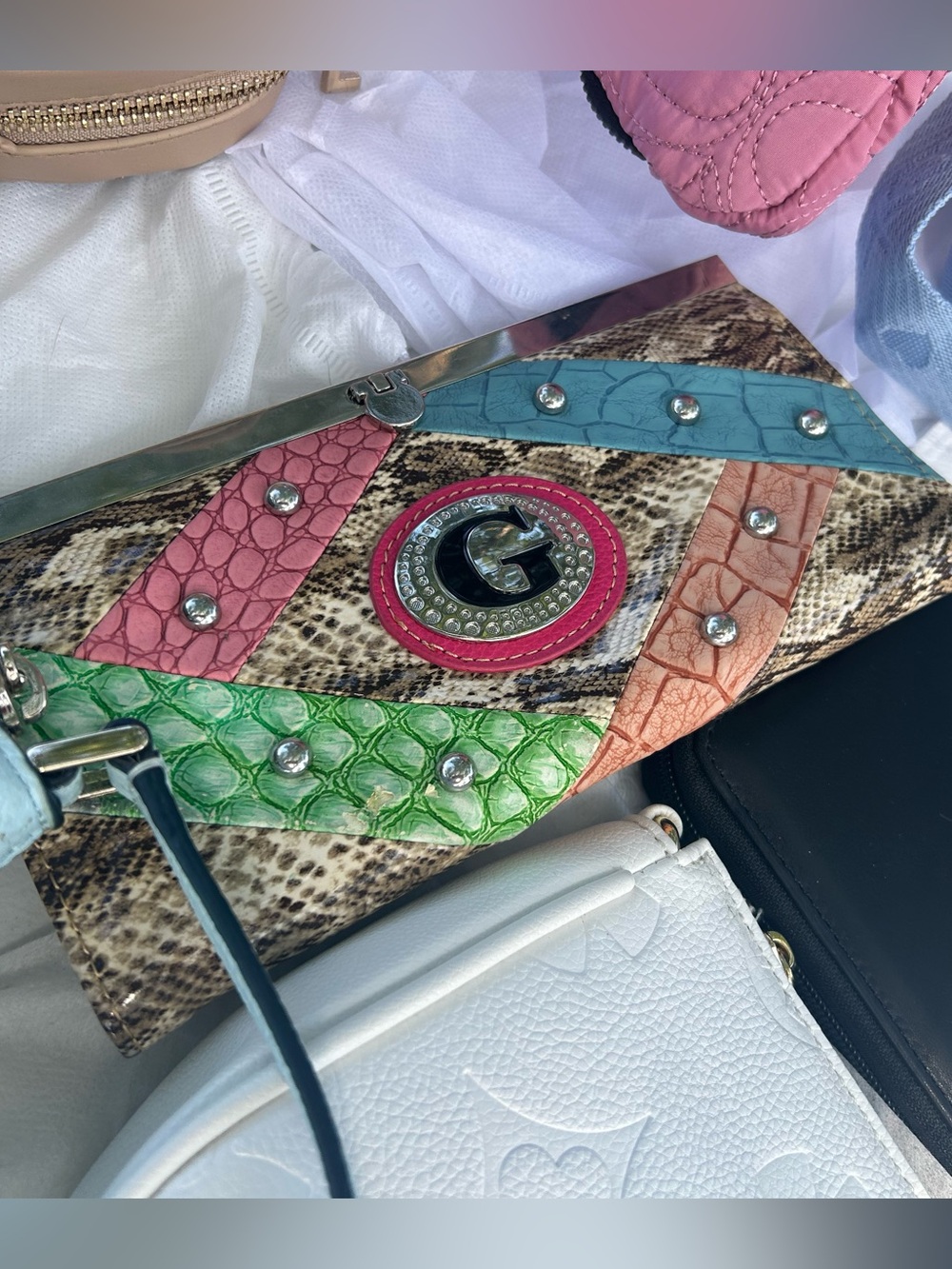 Multicolor Embossed Snake-Print Clutch with G Emblem
